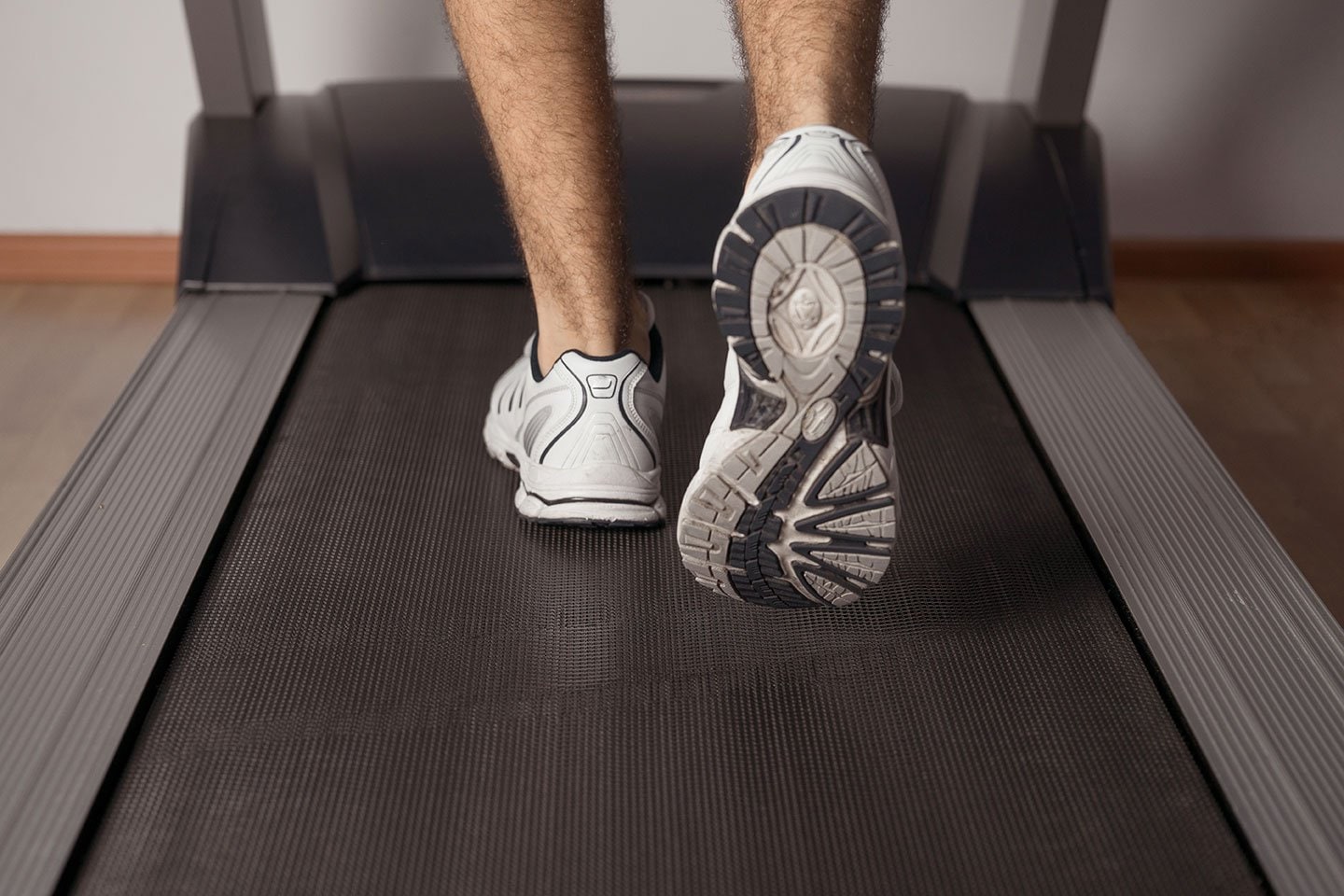 man walking on a treadmill