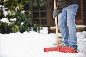 Shoveling snow outside